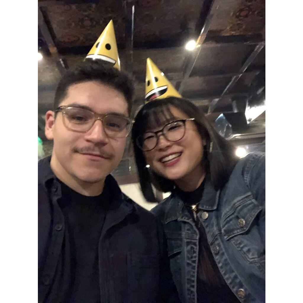 The very first picture we took together on our first date. We got sat at a group table and ended up at a birthday party...hence the birthday hats.