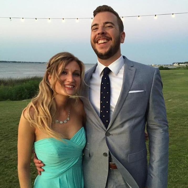 Nathan cracking up at Kelly’s jokes at their good friend’s wedding.