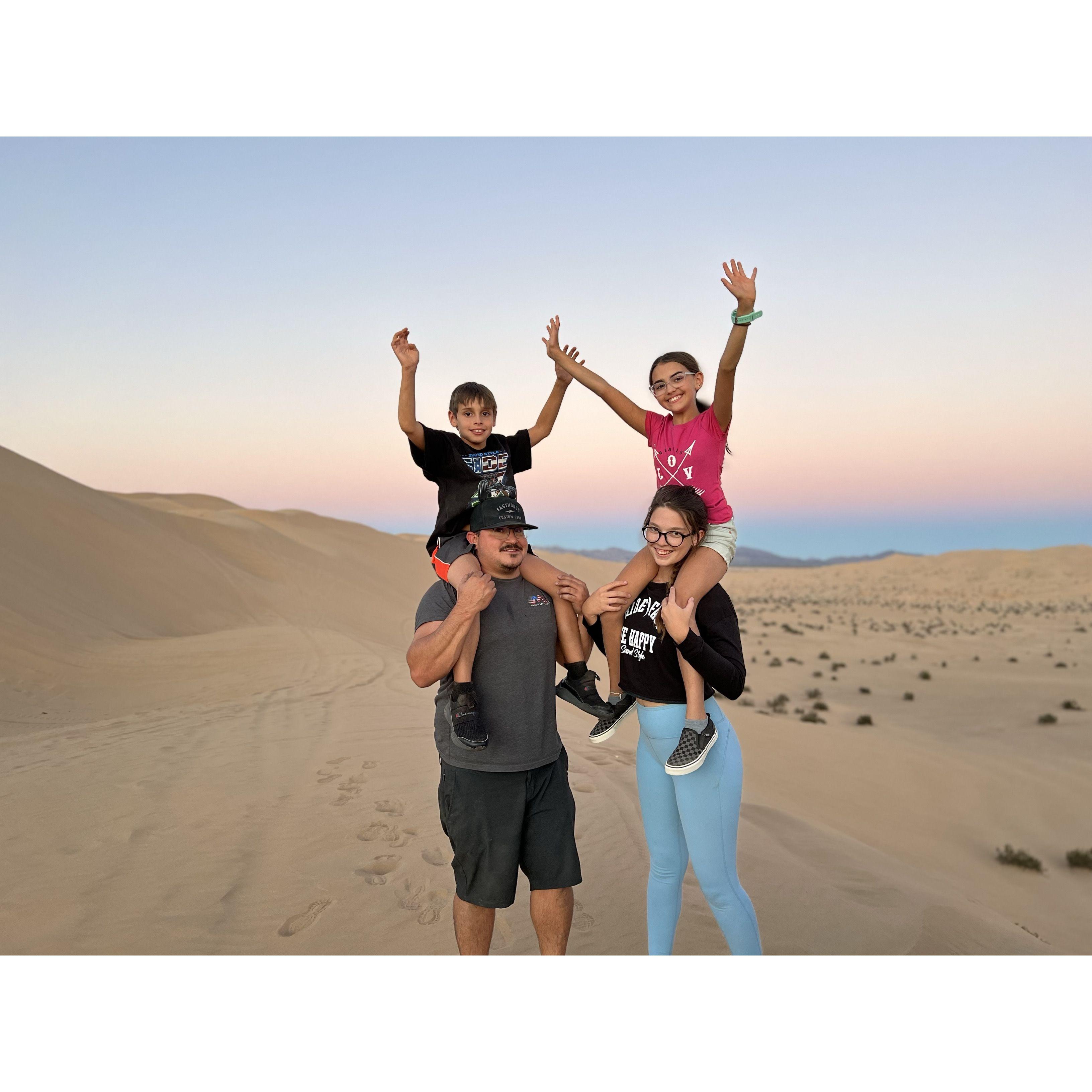 One of our favorite photos with the kiddos in our happy place, the dunes!