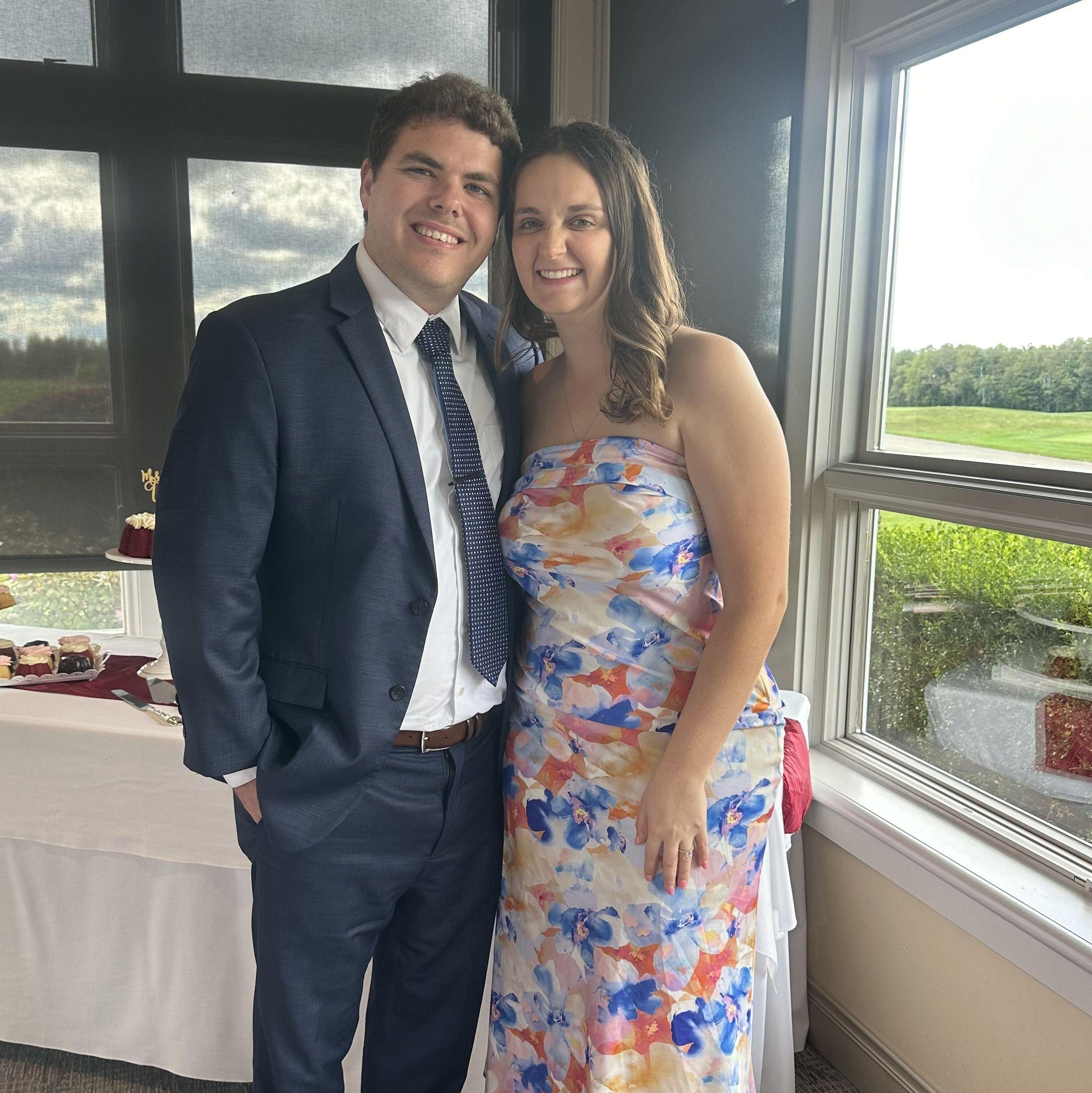 This is us attending a friend's wedding almost exactly a year before our special day!