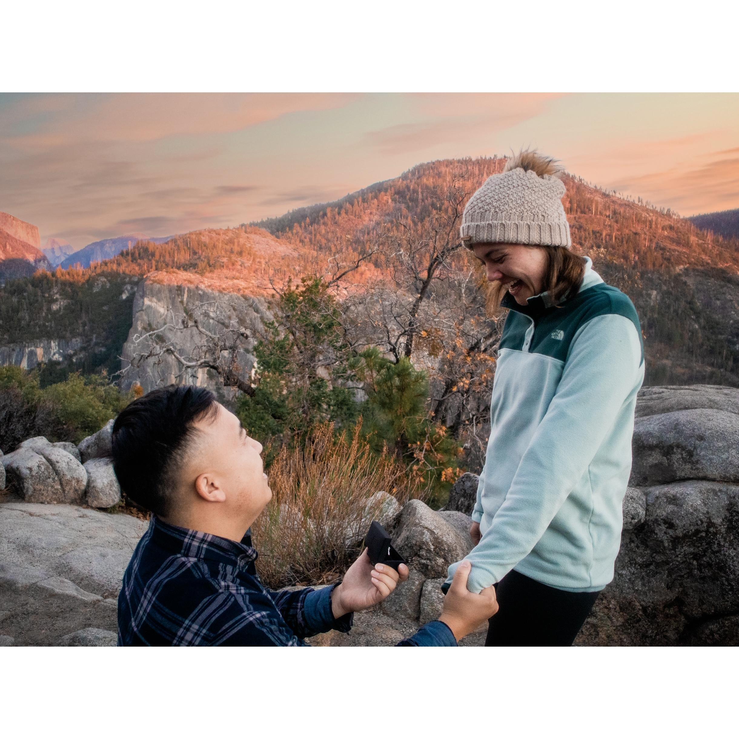 The moment that Surr proposed at sunset in Yosemite.