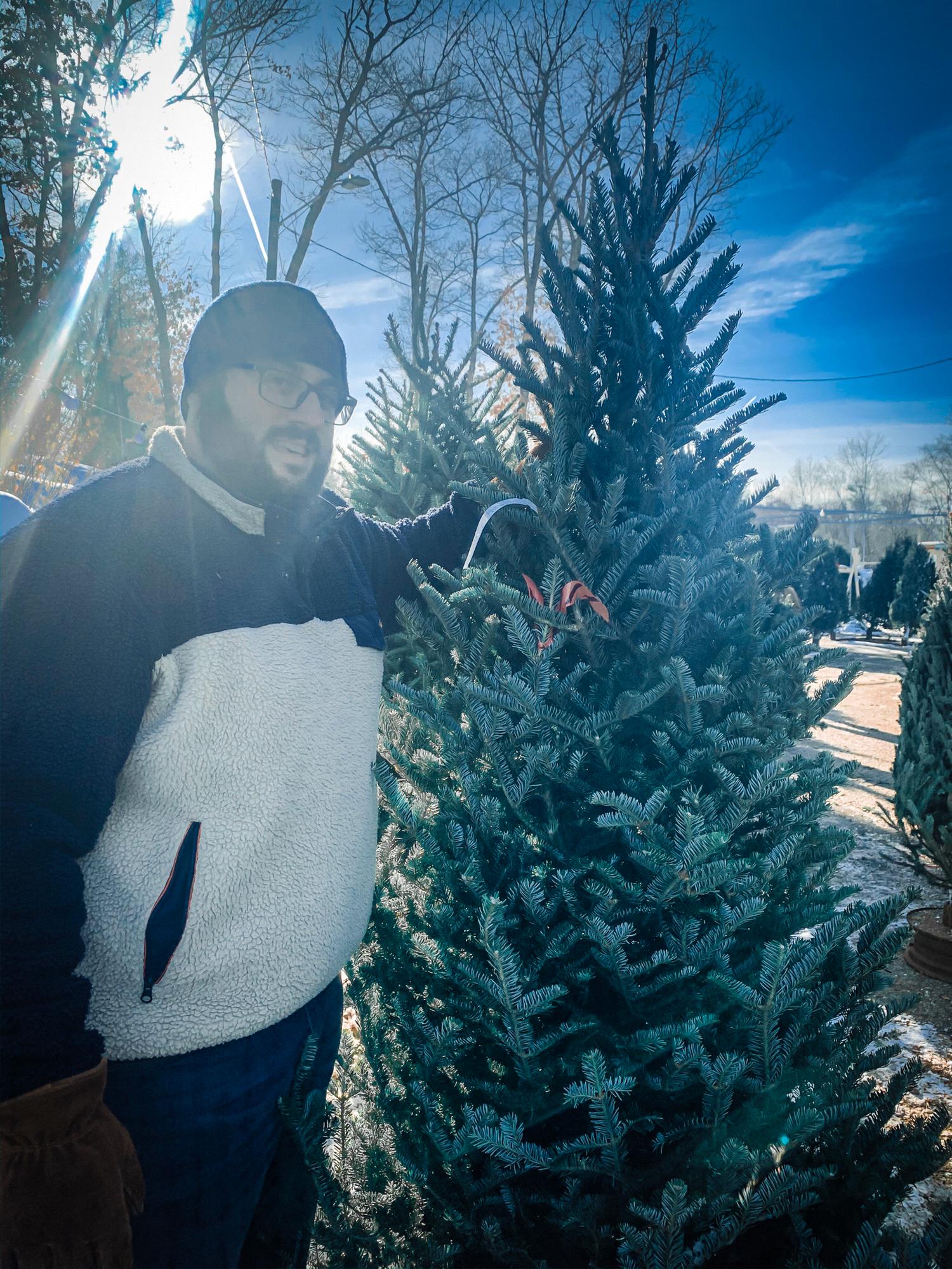 The day we got the tree he proposed in front of, the fastest we’ve ever picked out a tree and the fastest yes of my life when he asked me to marry him 🥰