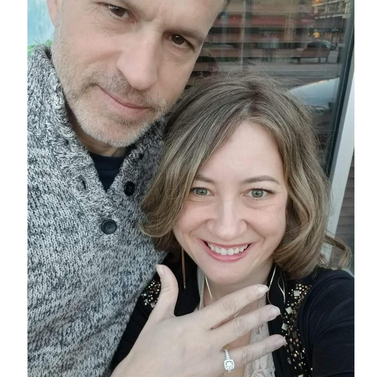 We took this picture outside of Sushi Nest, where we had our first date!