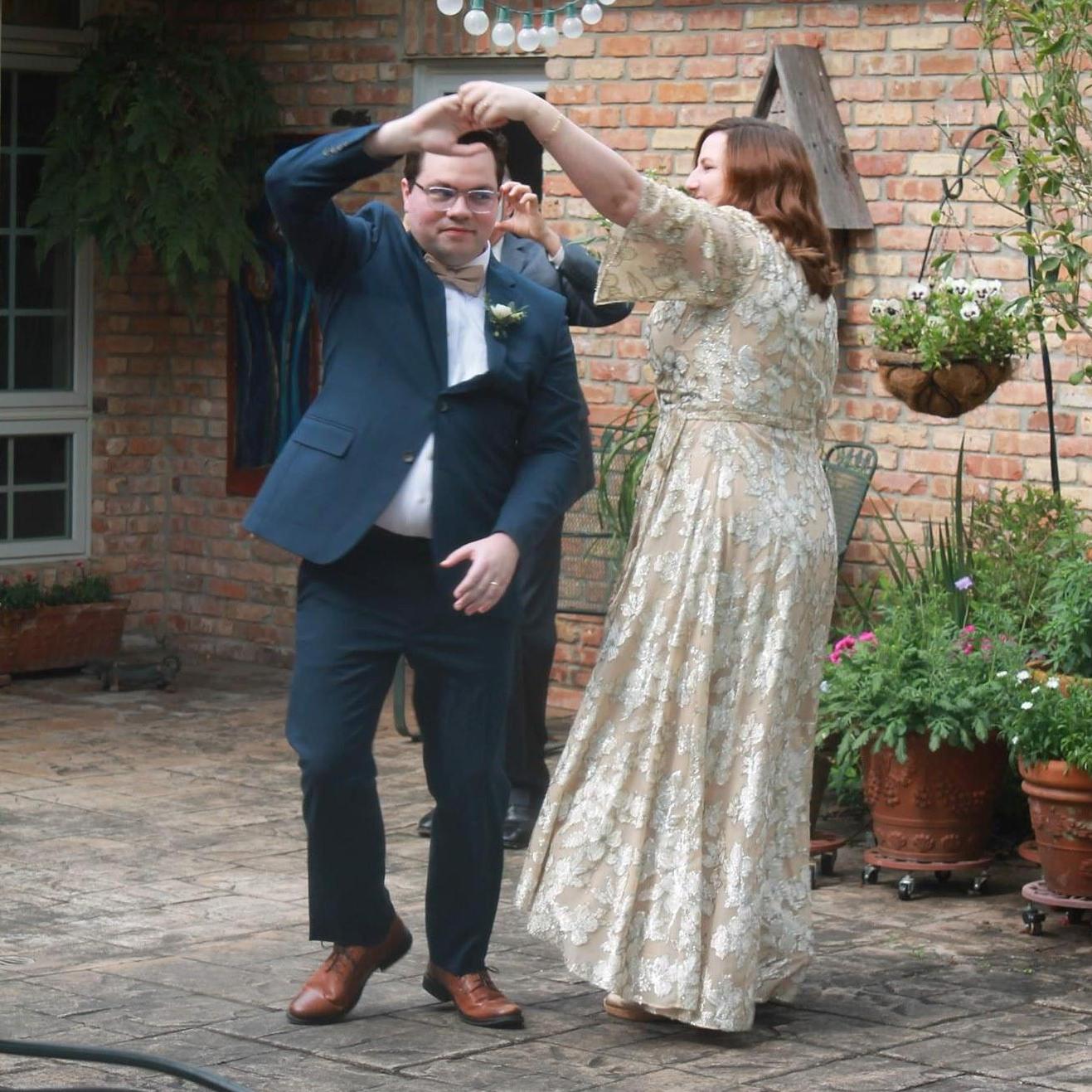 Dancing at our backyard Zoom wedding.
