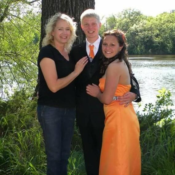 Trevor and I posing with his mom at our first prom 2012