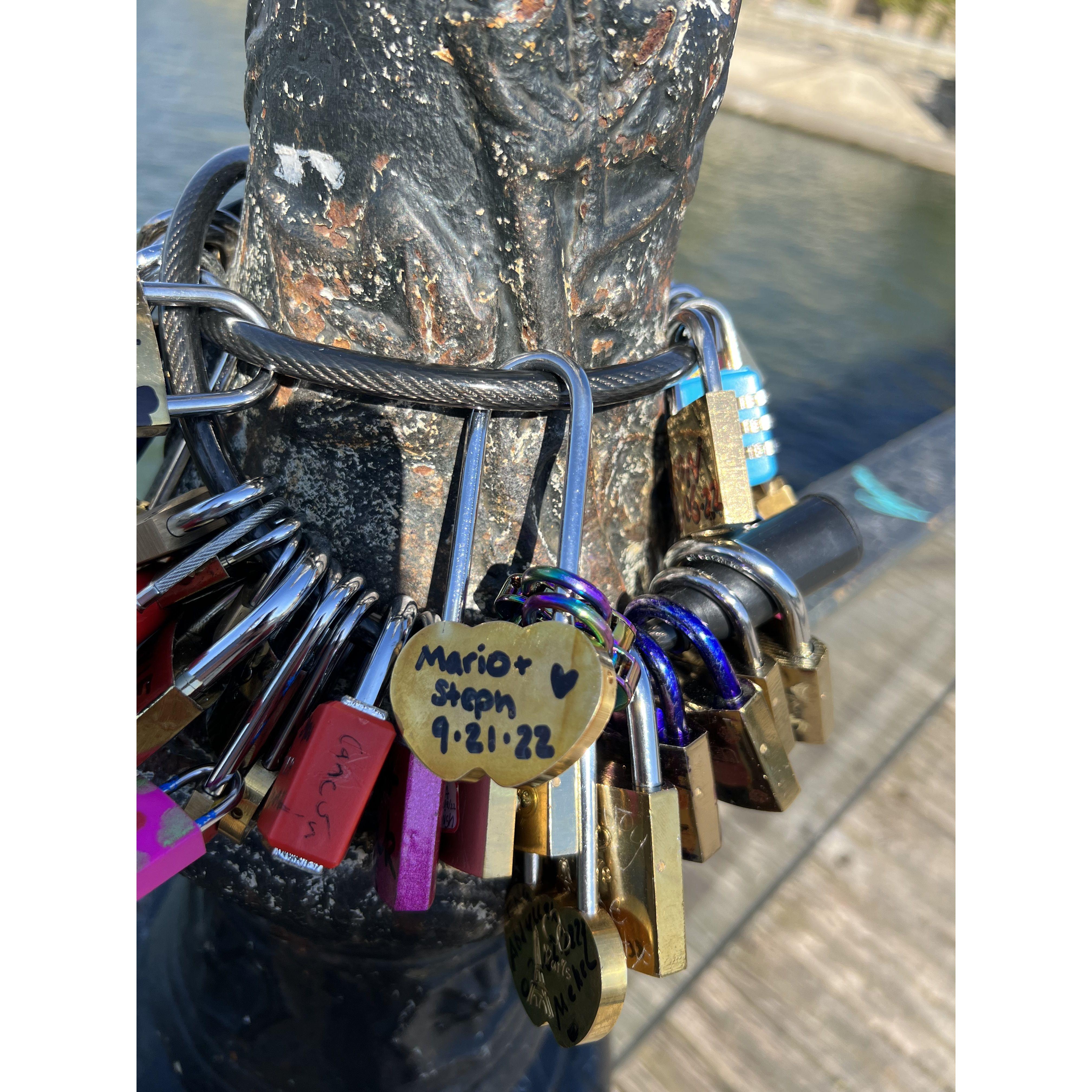 Put a lock on the Love Bridge in Paris, France