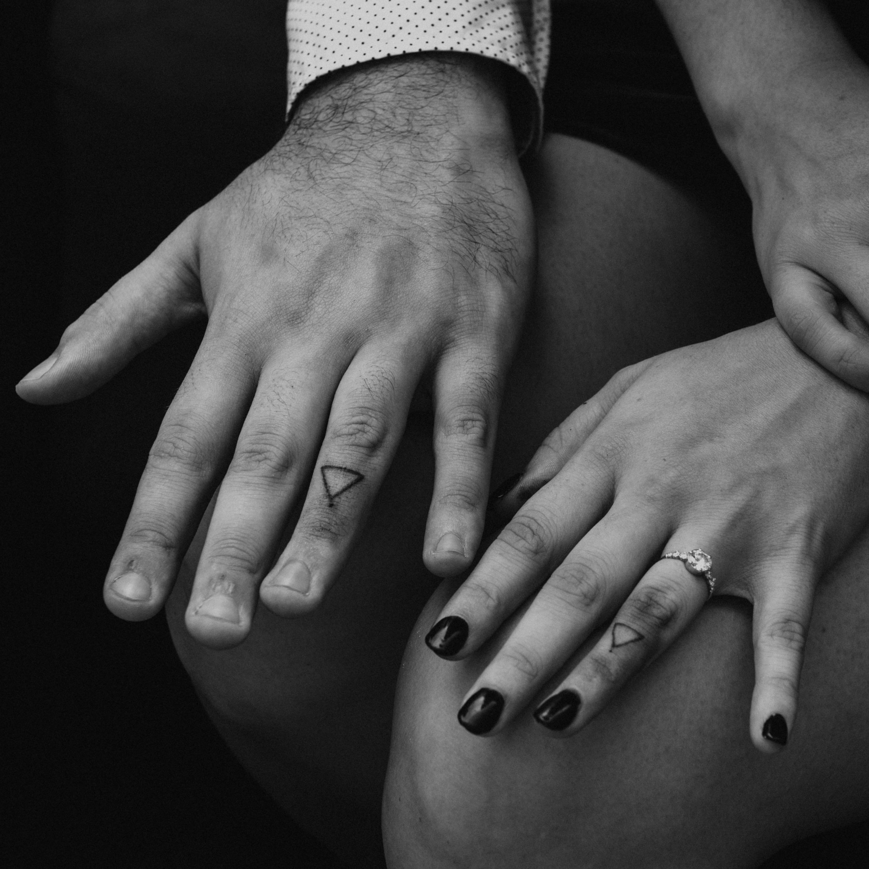 Our freshly tattooed “wedding bands”. When the characters come together point to point, they create a symbol that signifies connection. Also, they each point towards the other.