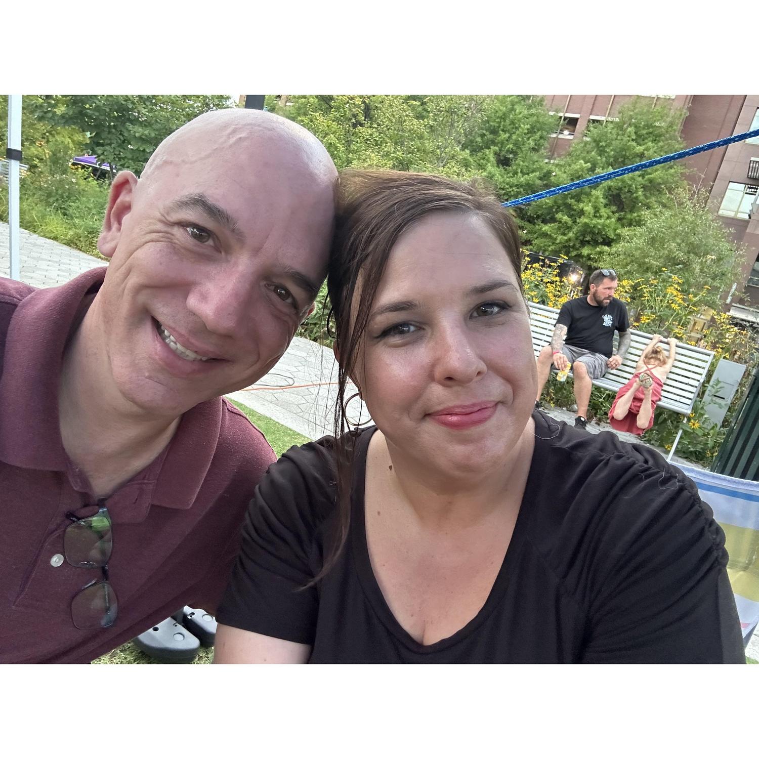 One of Todd's first markets selling coasters and Laura trying to not die in the heat.