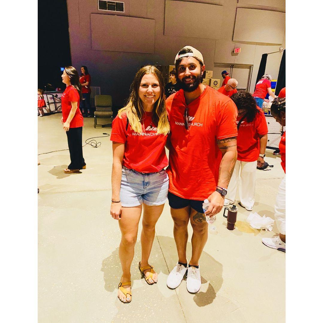 Volunteering at our church. We packed over 35,000 meals for children in Zambia. The opportunity to serve each other and serve others is a hallmark of our relationship and soon-to-be marriage!