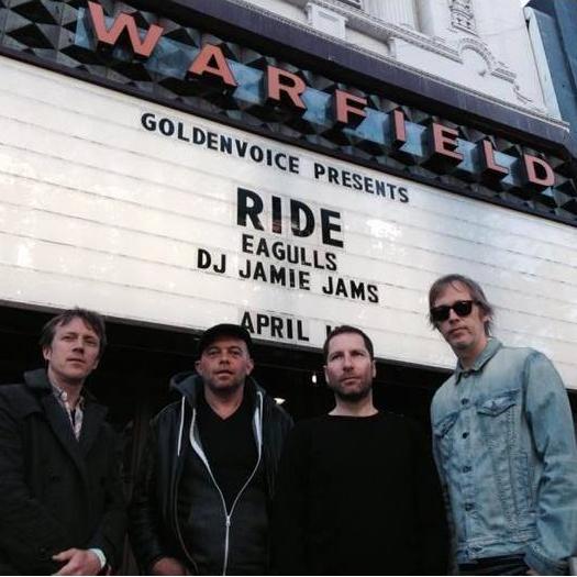 Photobombing the marquee with our second favorite band.