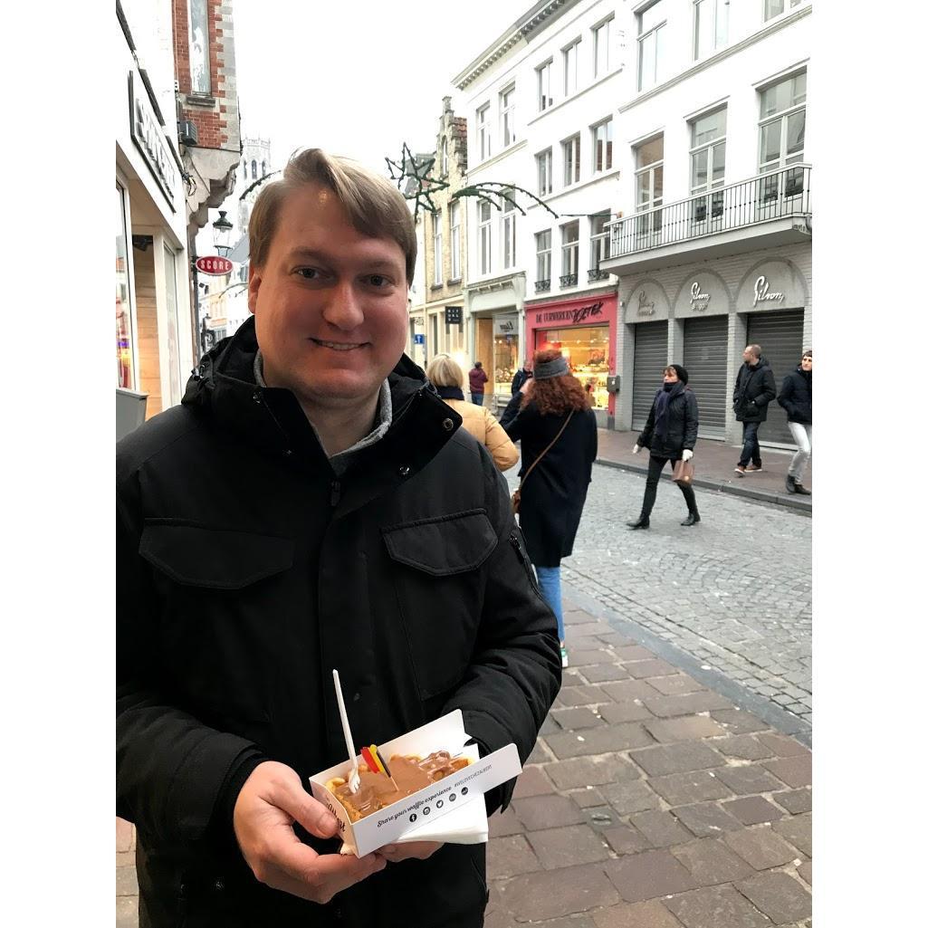 Andrew trying his first Belgian waffle (and is clearly very happy with it!).