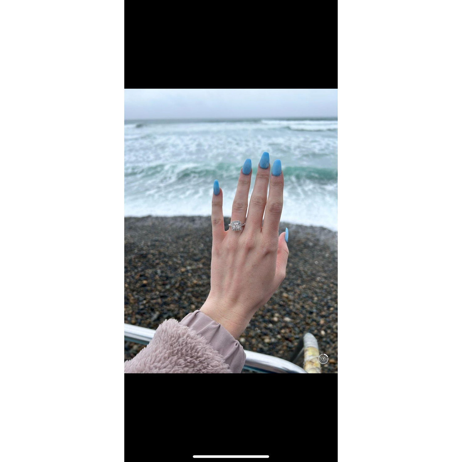 The first picture of Camille wearing her ring