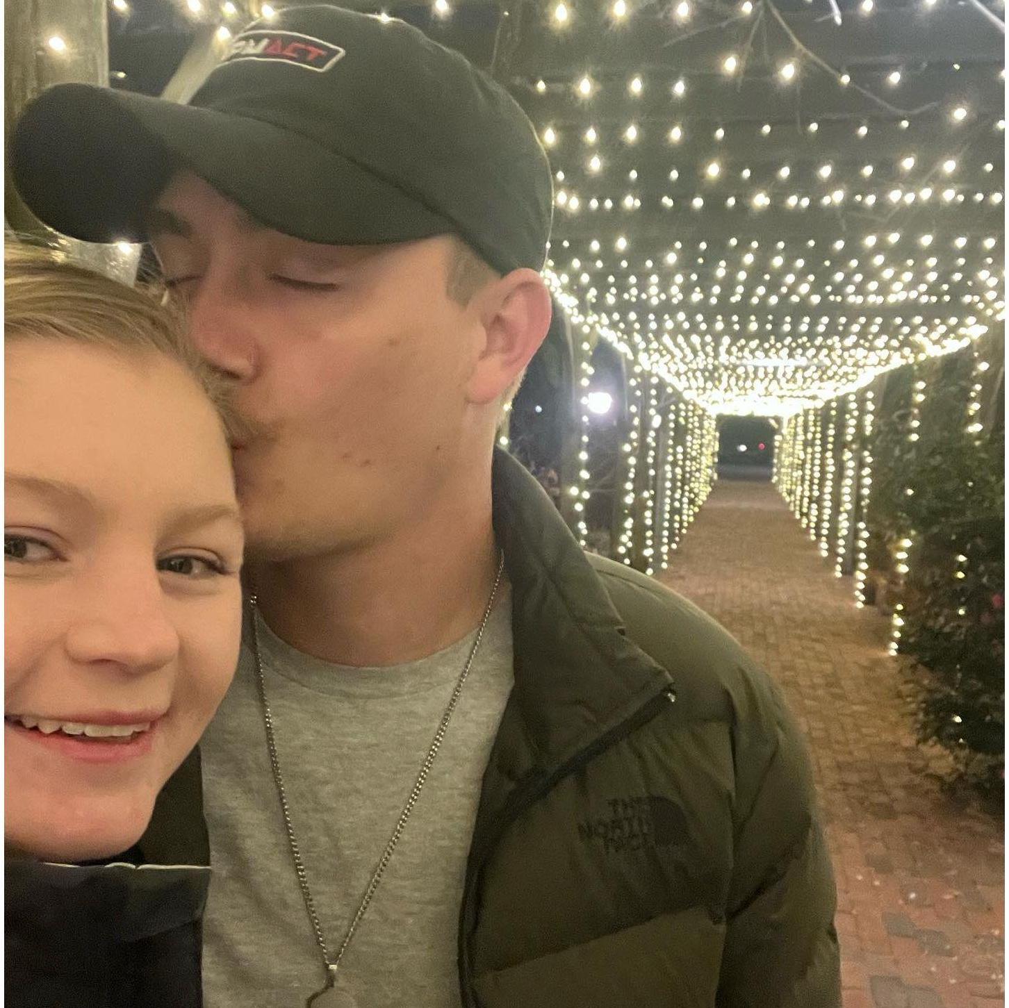 Forehead kisses on our first trip to Biltmore at Christmas in 2022.