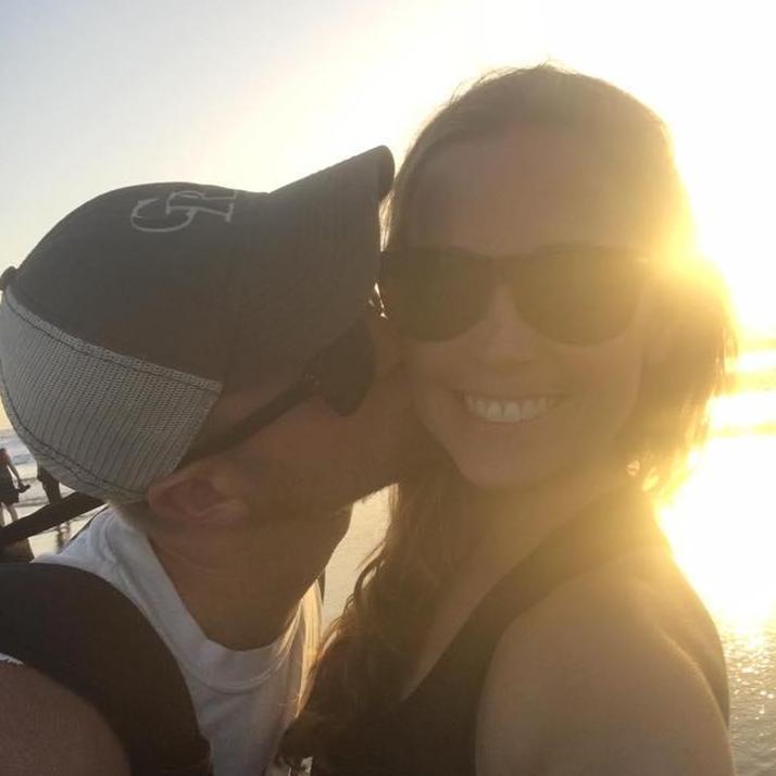Kissing the fiance on the beach!
