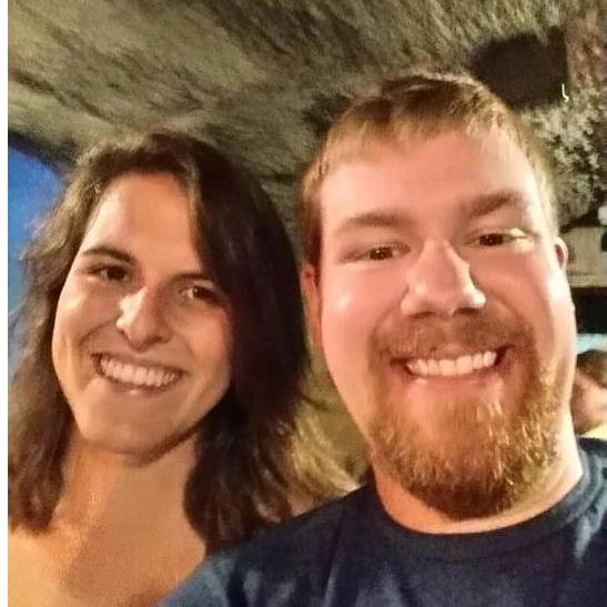 We are riding a mine cart at a mini golf course...yes you read that right.