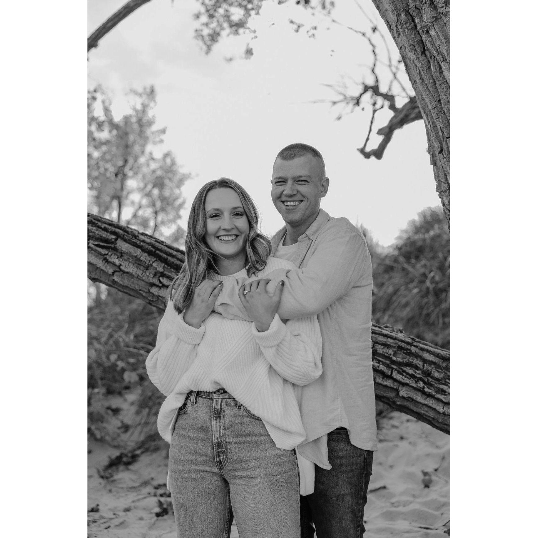 One of our favorite photos from our engagement session. We went to Grand Haven State Park to have these photographed. Our photographer did a great job making us laugh!