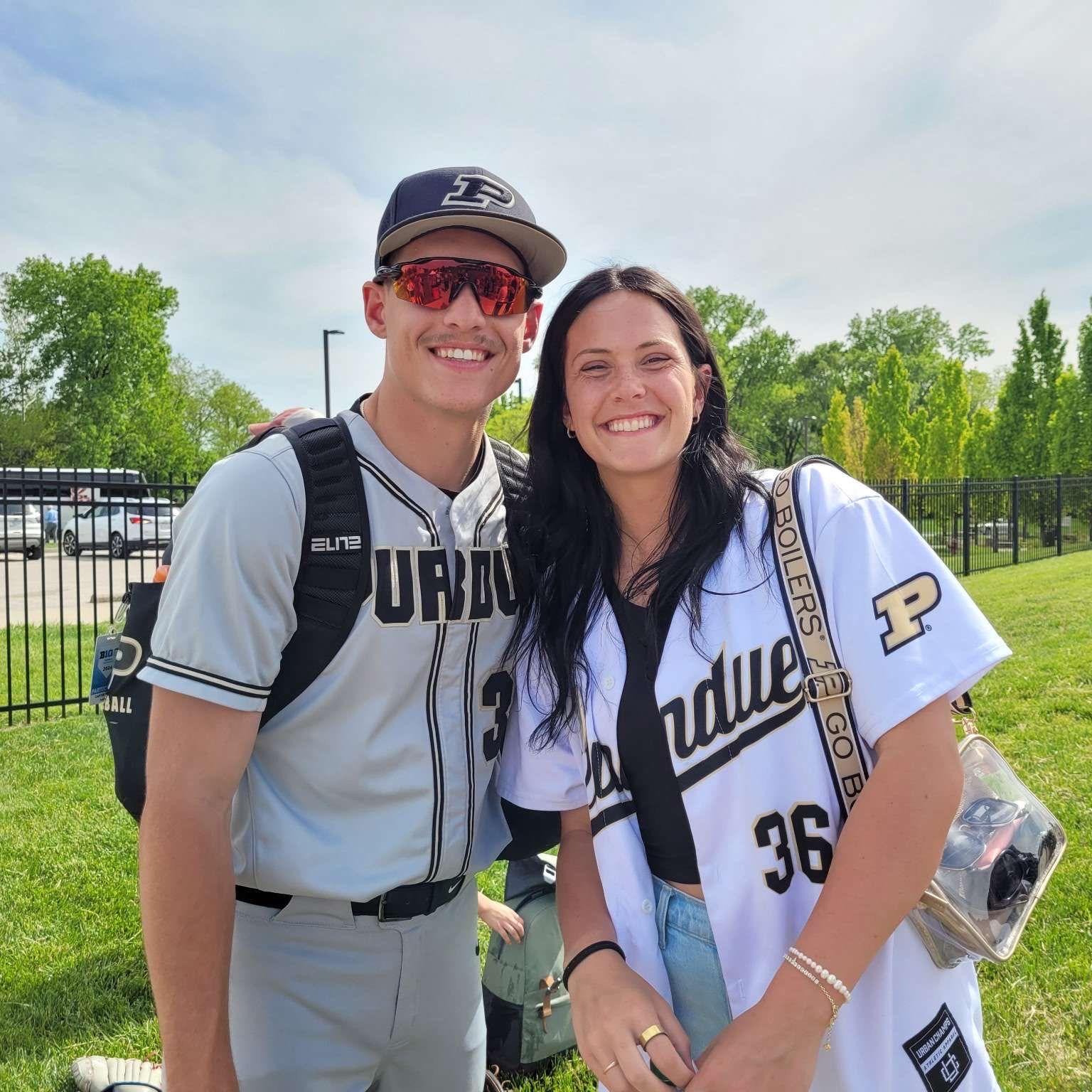 Madison supporting Carter in baseball.