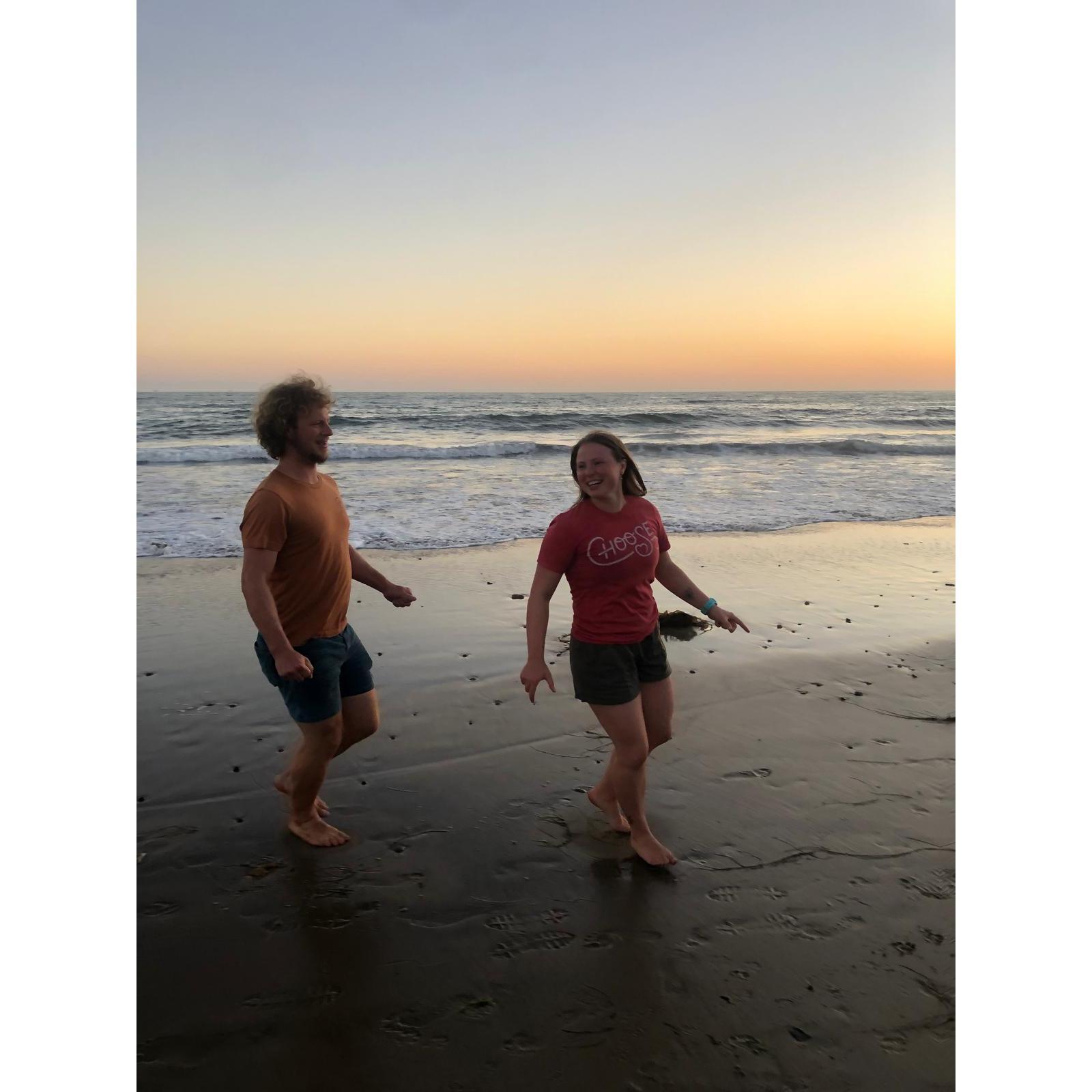 September 2024, Theo is chasing Elisha with sand crabs