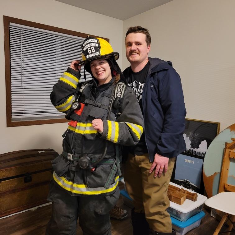 Hudson is on his way to be a certified firefighter for Pequot Lakes, MN. Of course, Katy has to test out his gear to make sure it’s up to spec: February 2024.