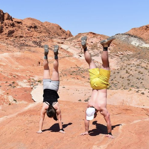 Fun fact: Tom's handstand record is 29 seconds and Andrea's is 9 seconds.