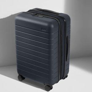 The Bigger Carry-On Flex in Navy Blue