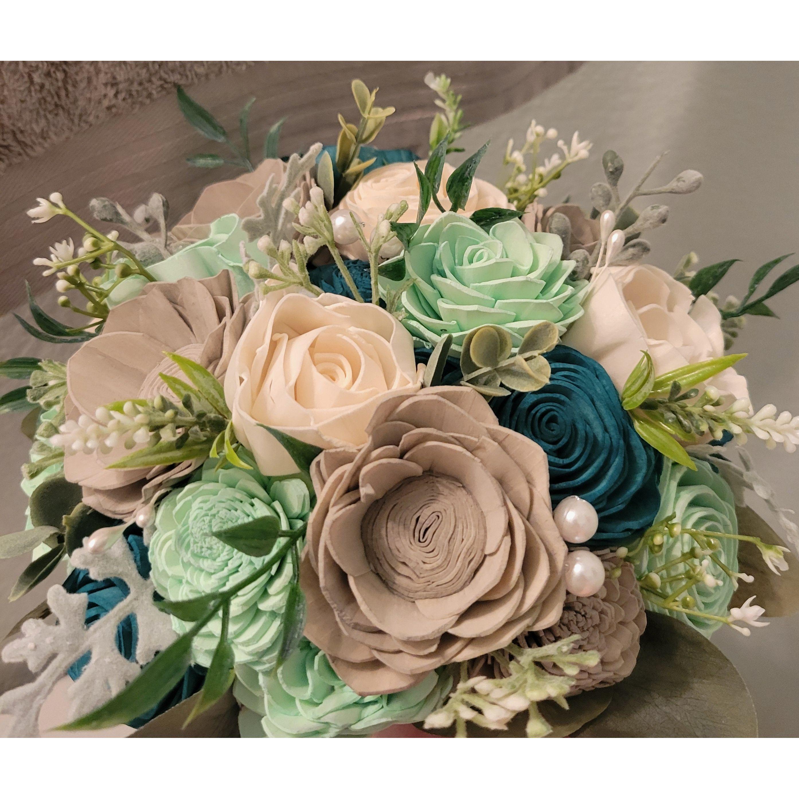 This bouquet shows examples of the colors you may wish to wear to join the wedding theme :)