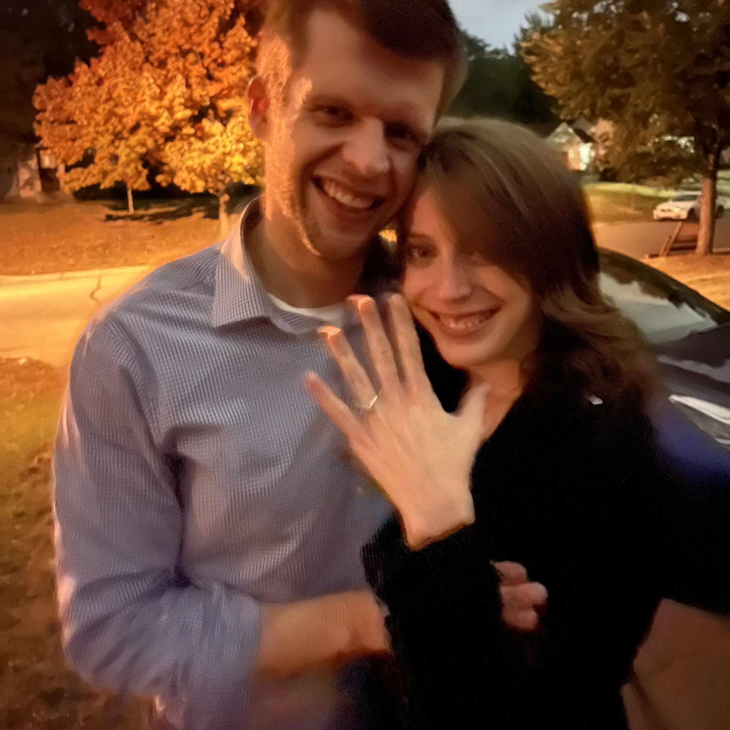 09/30/2022: The night we got engaged! We drove straight to our BFF Neil's after dinner to share the news and he snapped this photo of us.