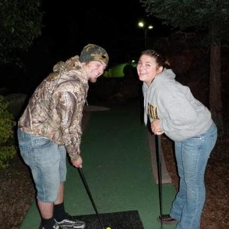 Kyle loves to golf, even if it is mini. Mini golfing in 2010.