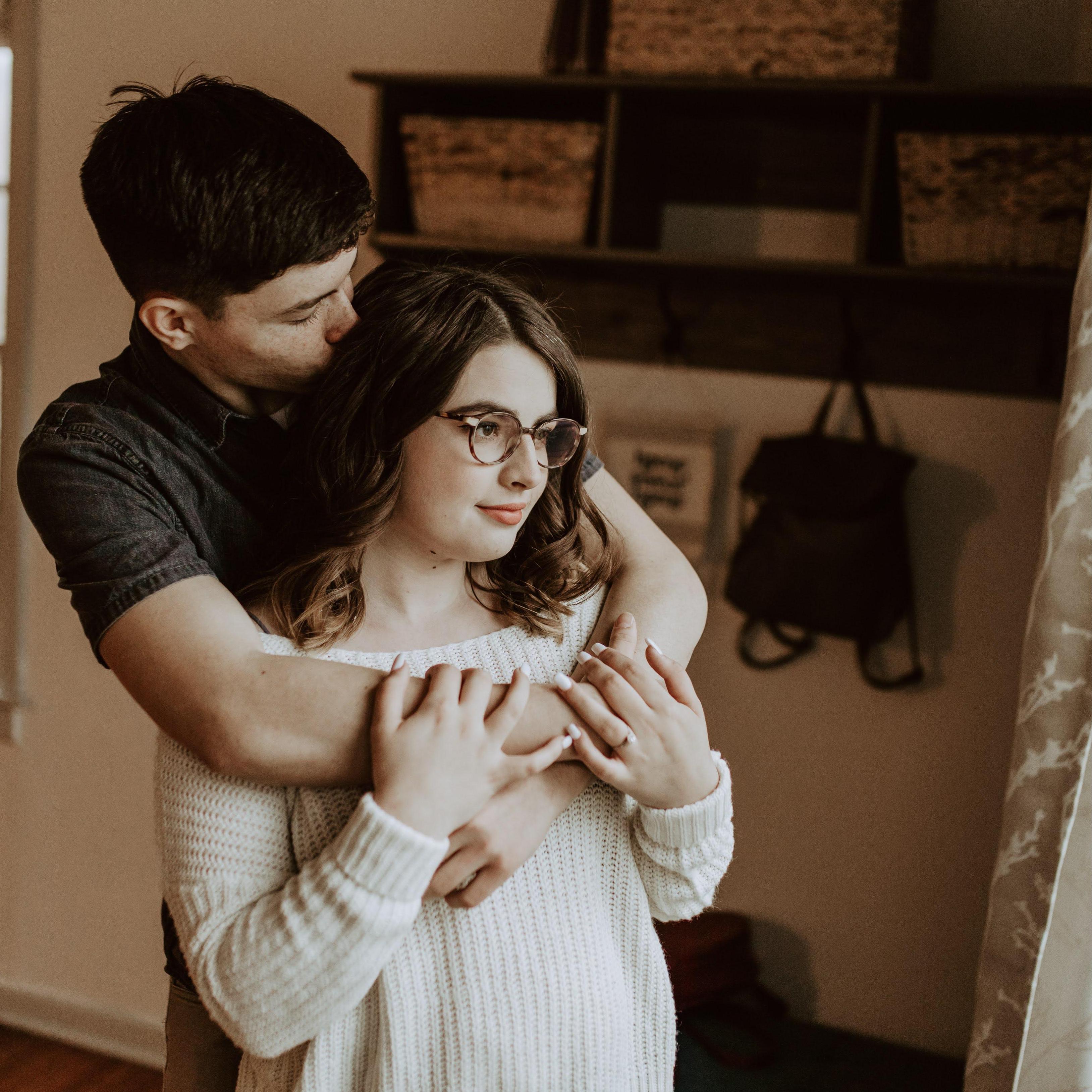 March 2021. The Couple takes their engagement photos! One of the two settings of these images was in their own home! This is the groom's favorite image from this photoshoot!