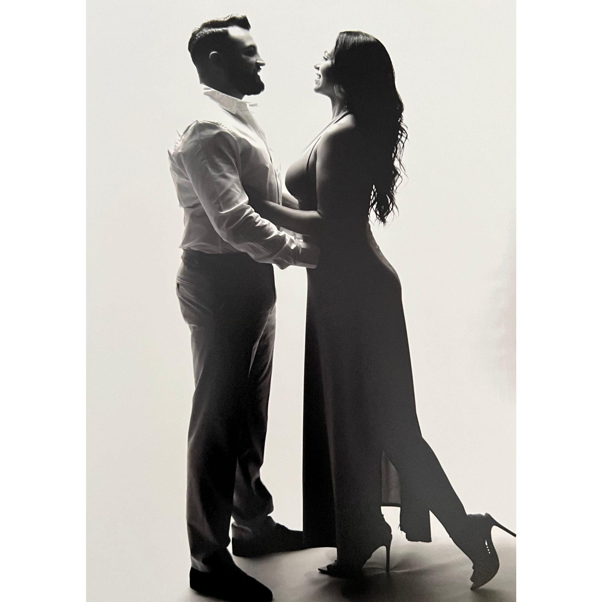 This silhouette photo of us captures the essence of our love in a simple yet powerful way. The contrast of our shadows highlights our connection and the journey we're about to embark on together.