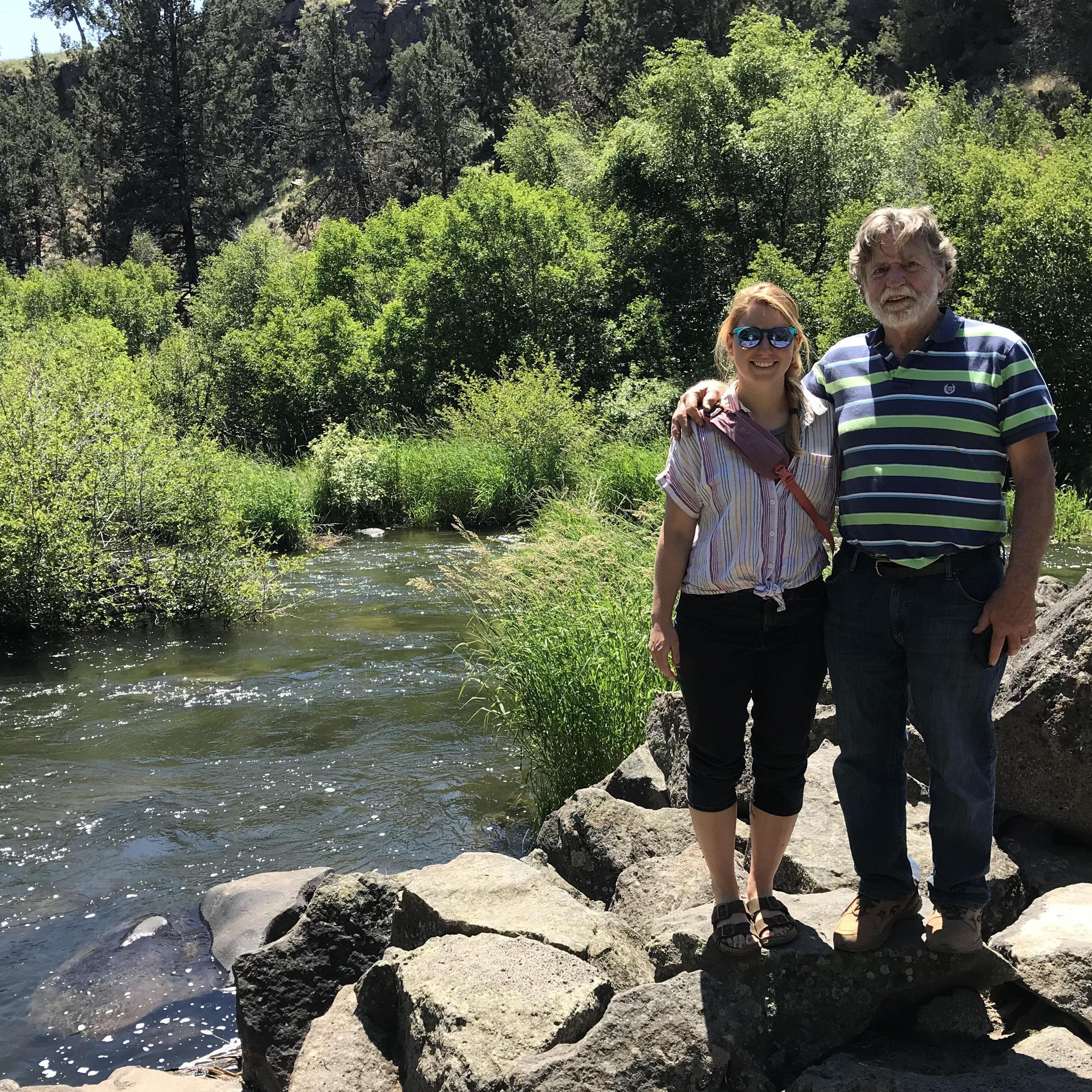 Roy and Janetta hanging out by the Bend River in Bend, OR.