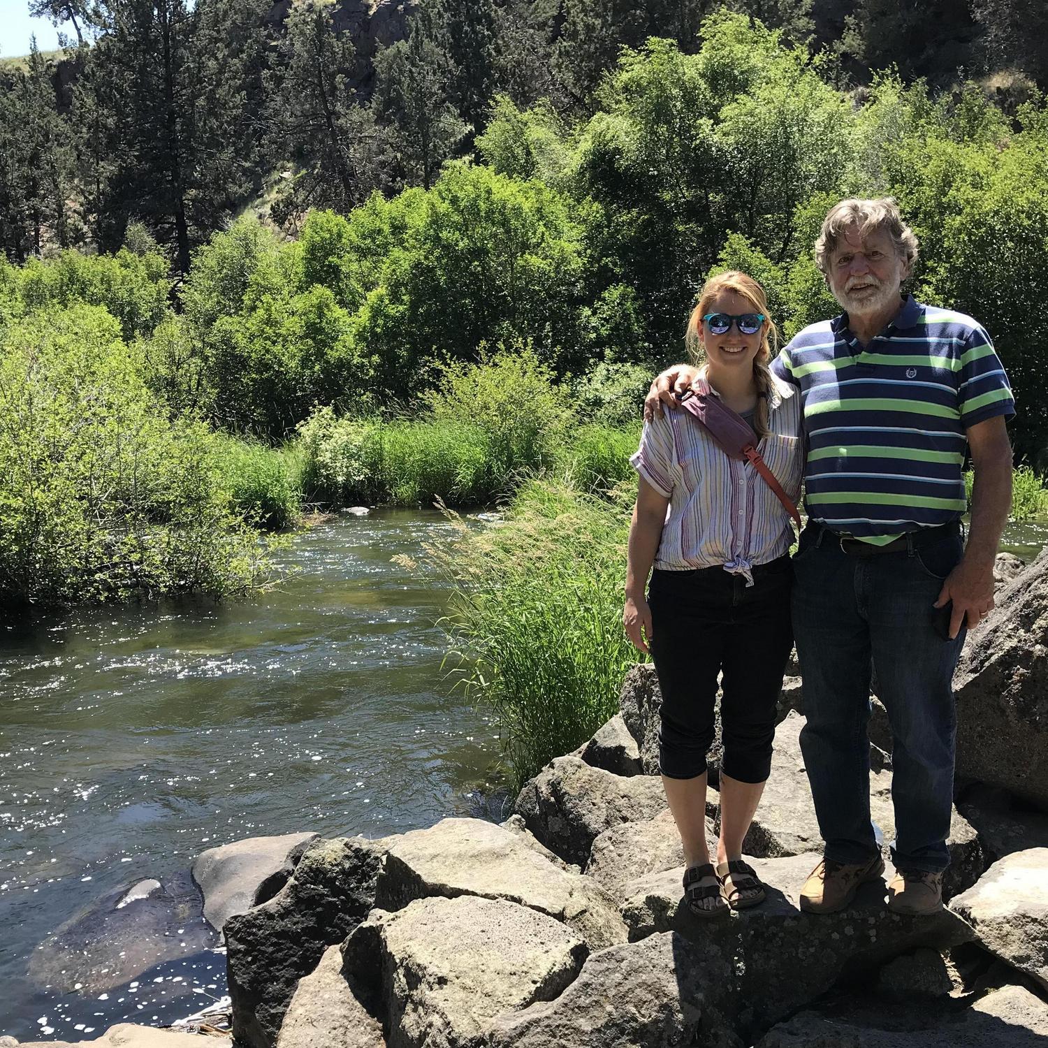 Roy and Janetta hanging out by the Bend River in Bend, OR.