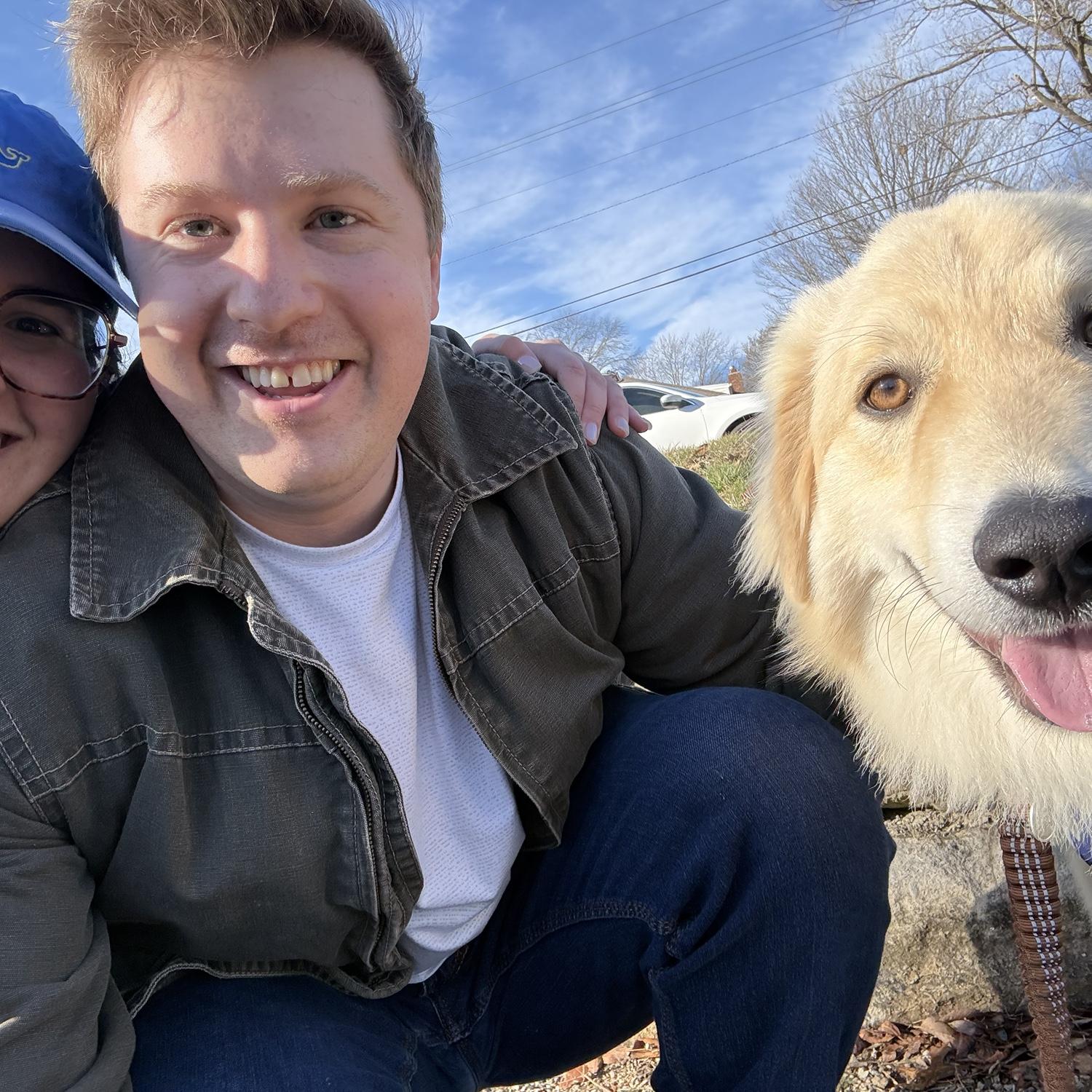 Koki and Mitch with their latest addition—Hank!