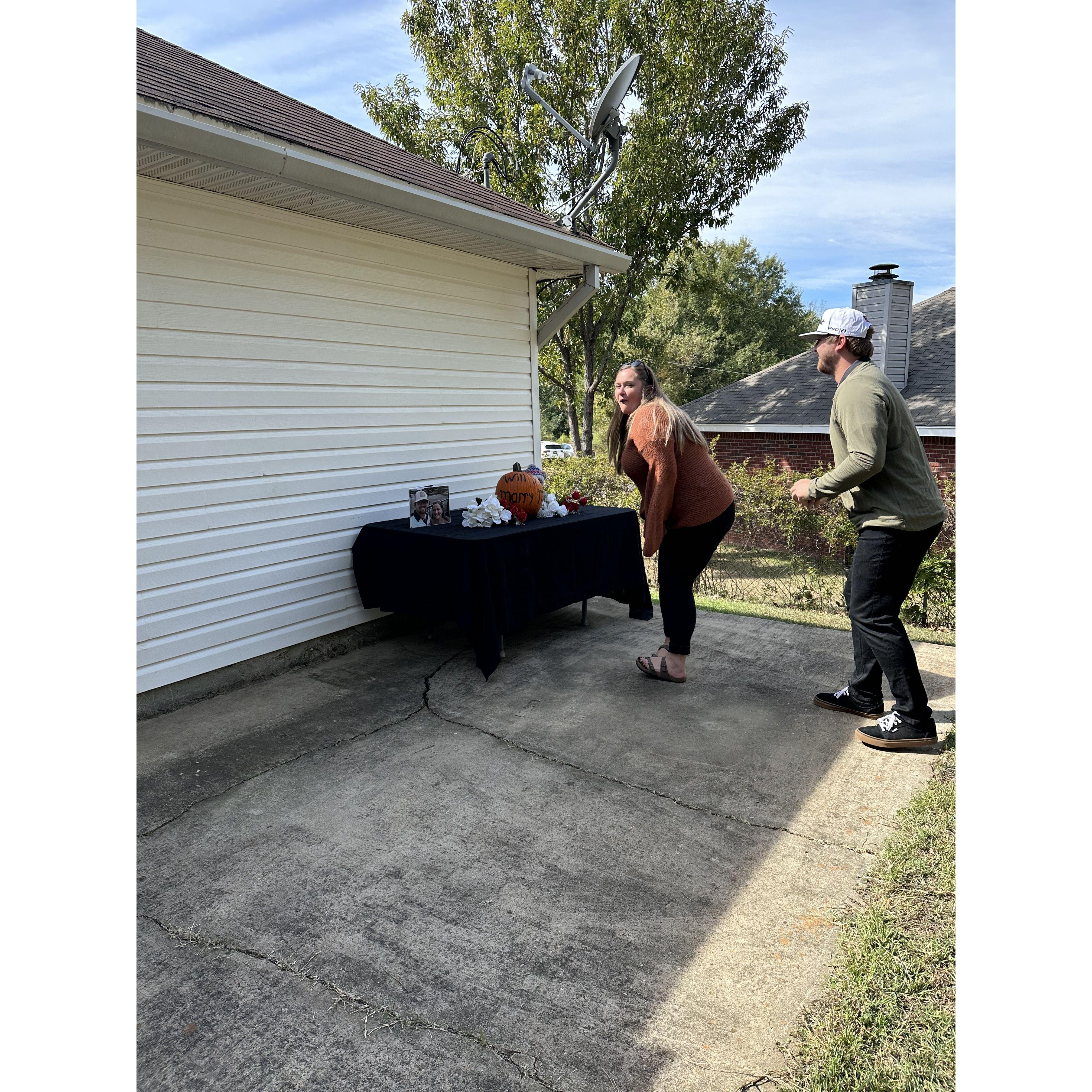 Kat didn't even give Dustin time to get down on one knee before turning around with excitement after reading the pumpkin!