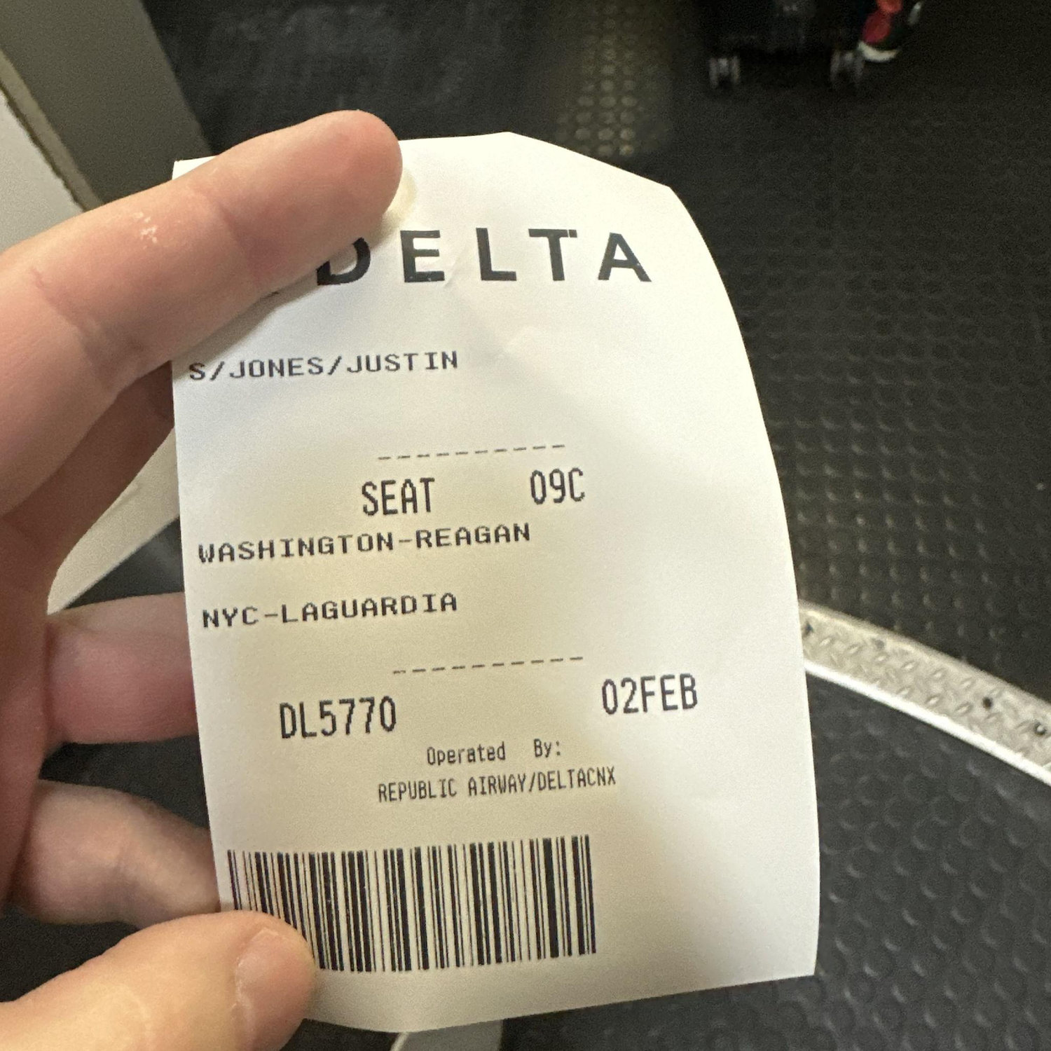 Justin's seat assignment for his flight to New York for our first date