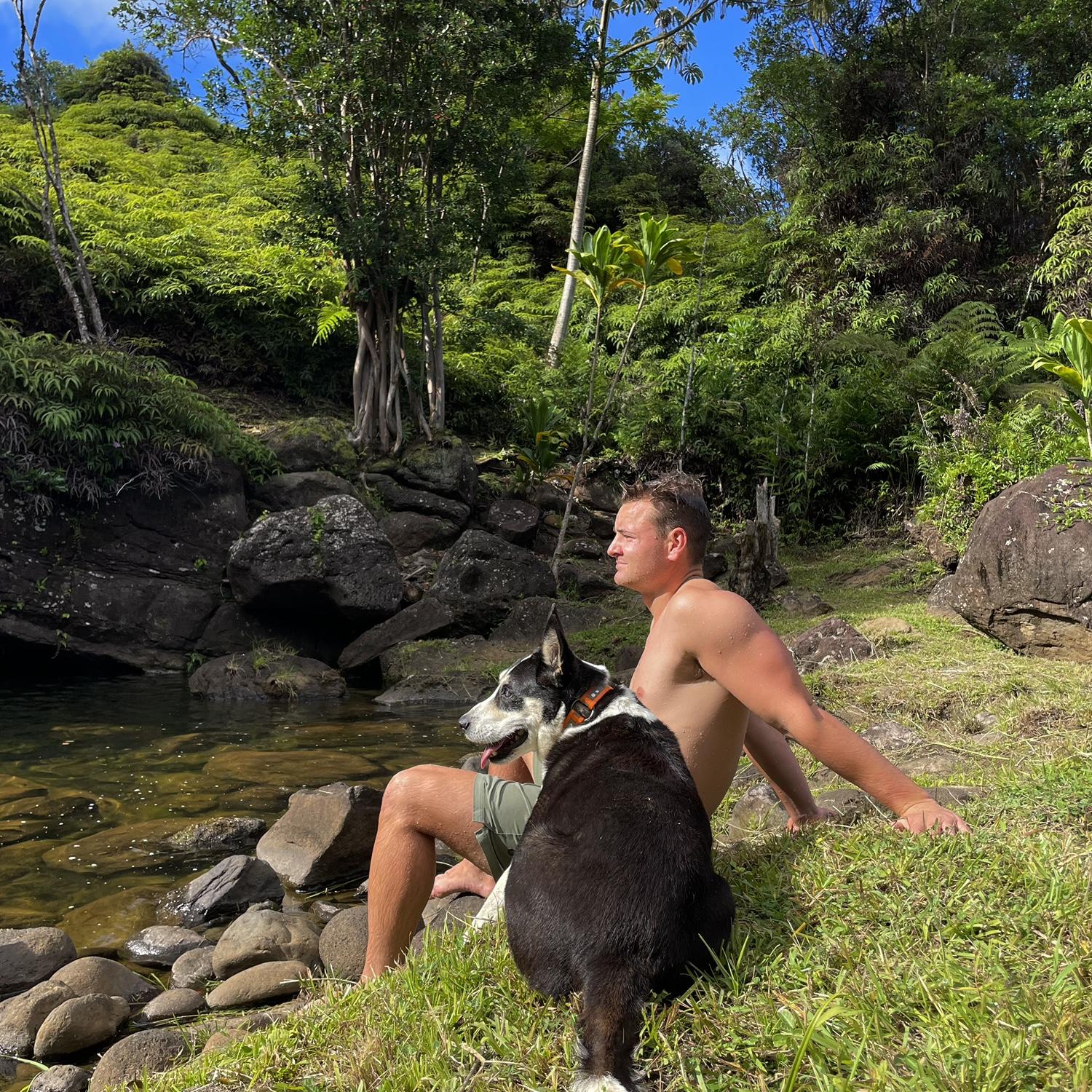 Dec 2024: Daisy (Sam’s dog) and Jackson chilling by the waterfall hangout in Sam’s parents’ backyard