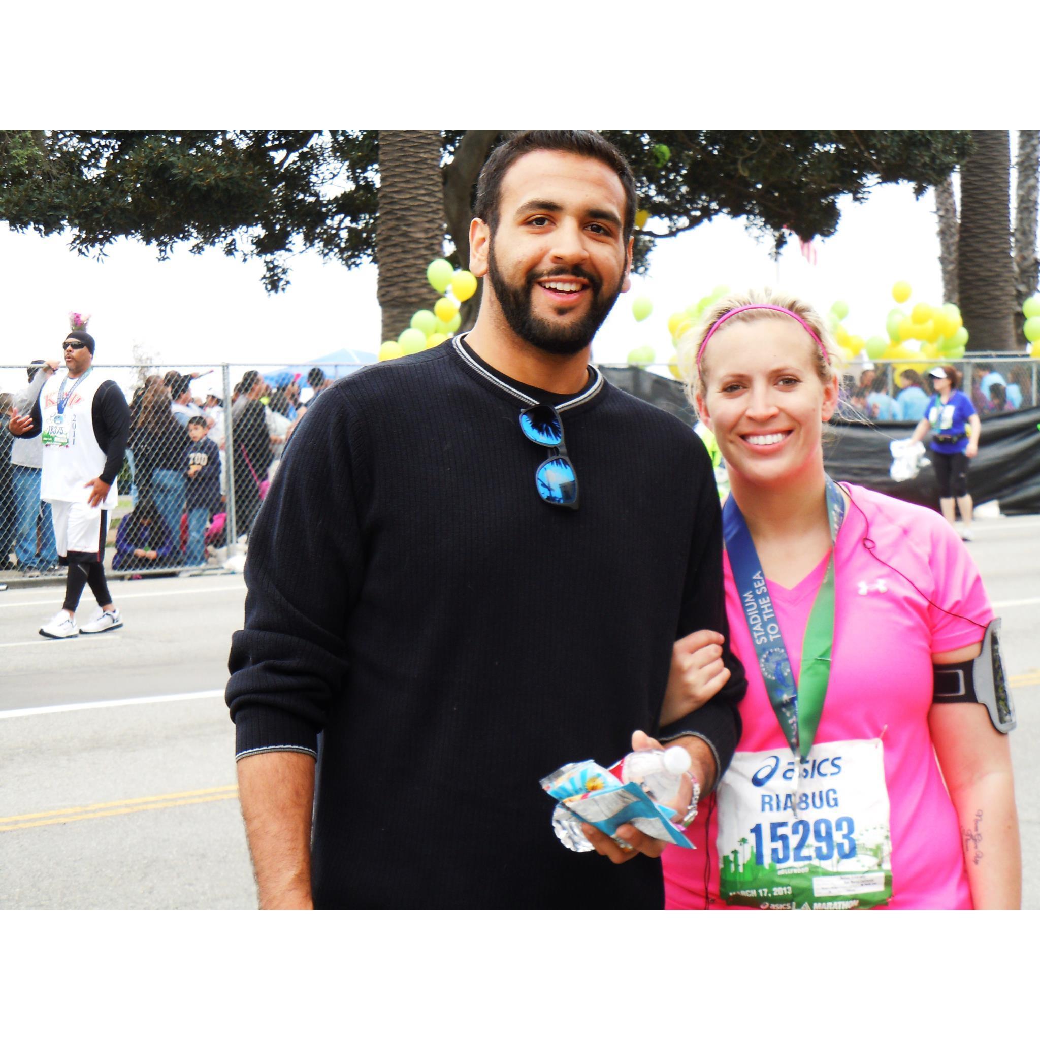 LA Marathon 2013. Paul found Raissa at the last mile and ran on the other side of the fence to meet her at the finish line!