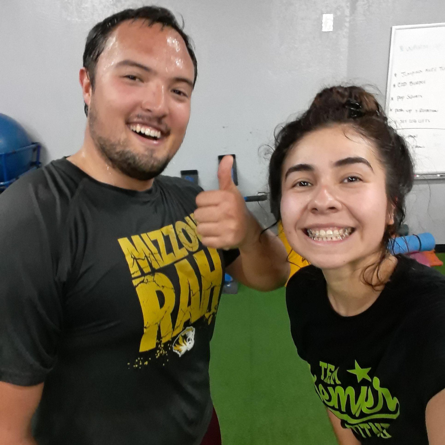 At the gym, sweating together