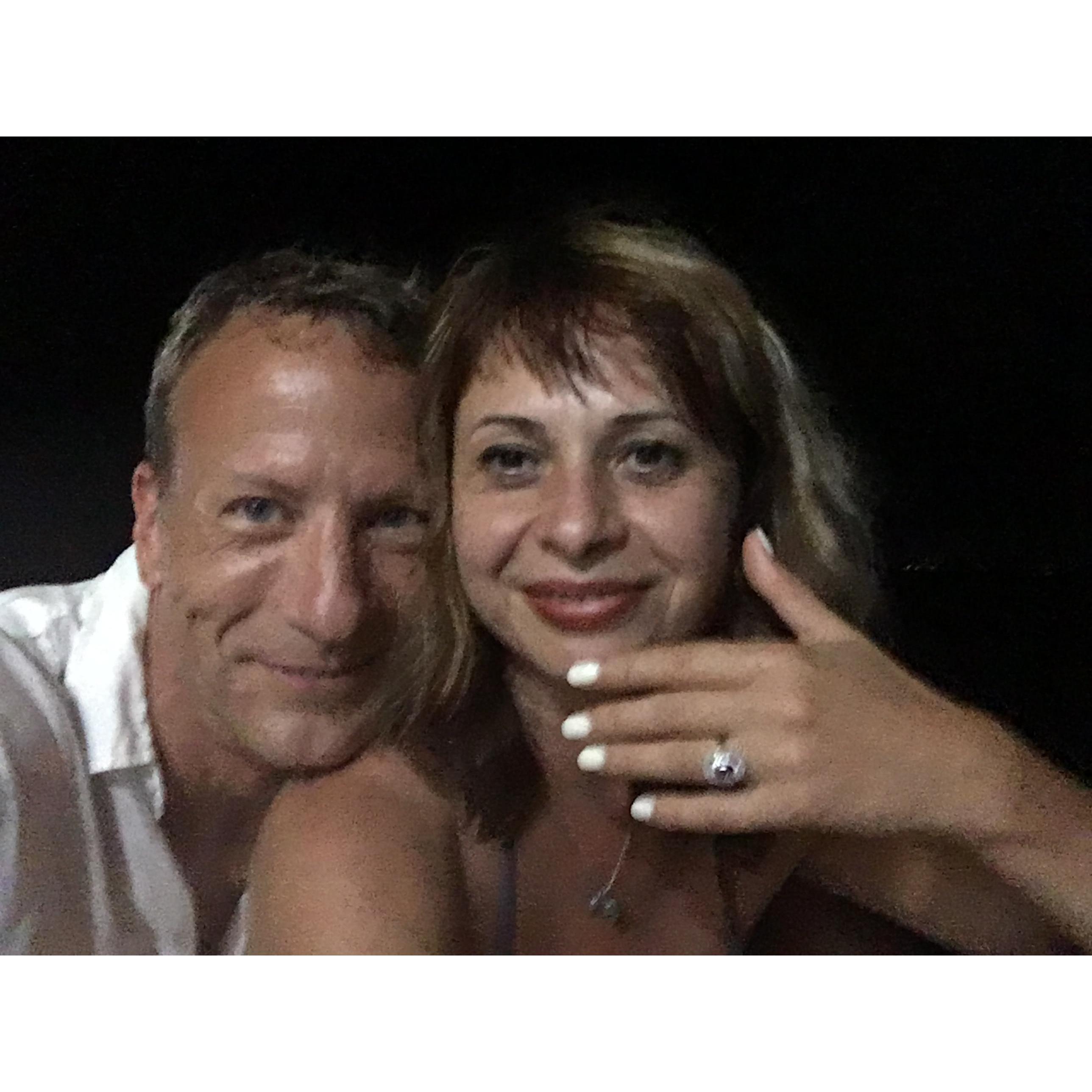 ... so that night, Liam knelt at the end of a pier under the stars in Cozumel to ask the most important question of his life. Dilyana's answer came with a big ring, and two even bigger sappy smiles.
