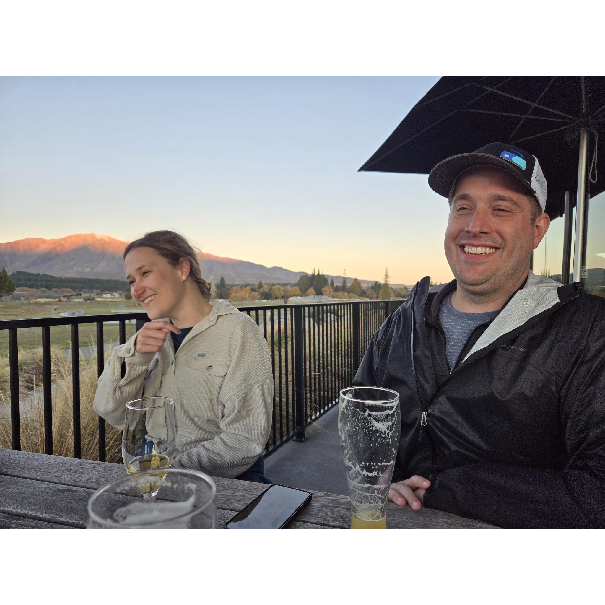 Smiles and laughs with a New Zealand sunset.