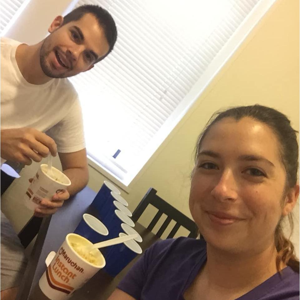 Enjoying our last meal in our first apartment together in the summer of 2018.
