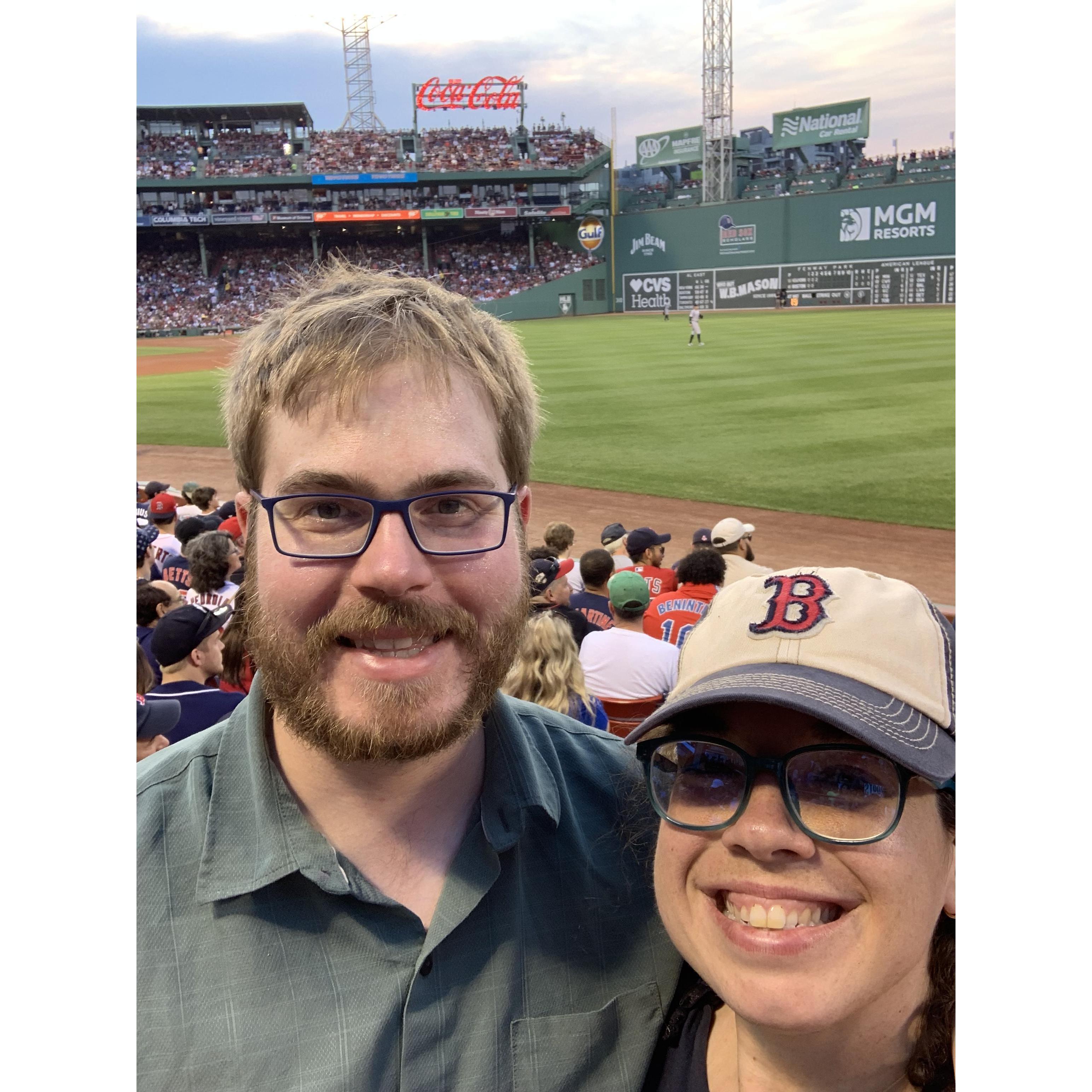 Enjoying a nice toasty summer evening at Fenway Park