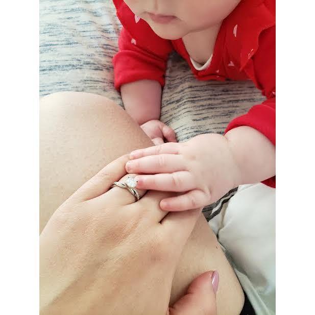 Ellie inspecting the new bling