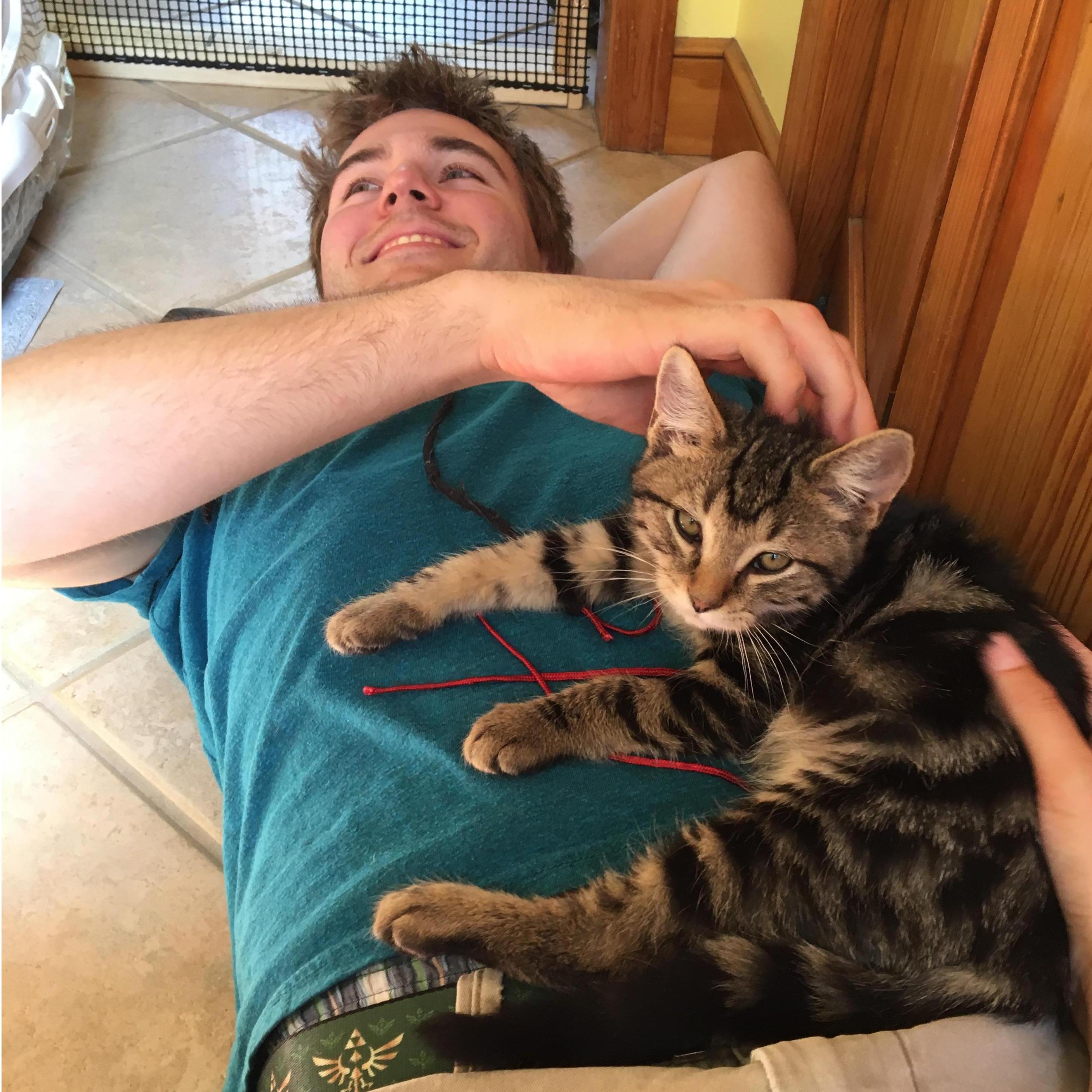 Nick loving baby Logan (one of the Gallups new kittens)
