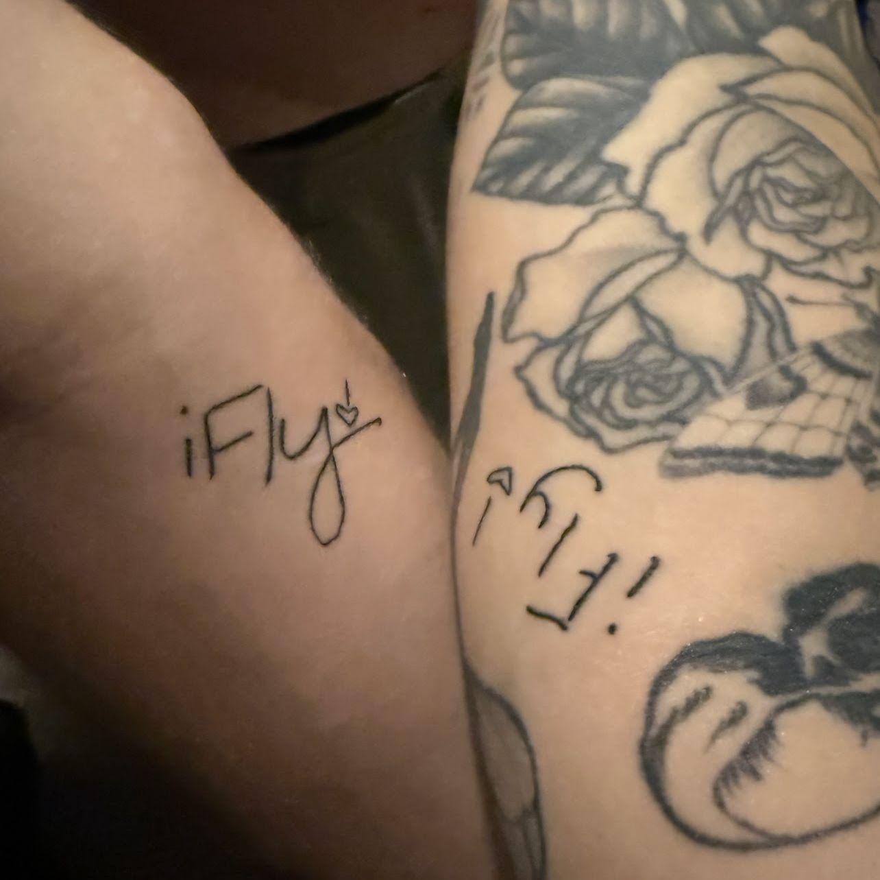 Matching "I fucking love you" tattoos in each others handwriting