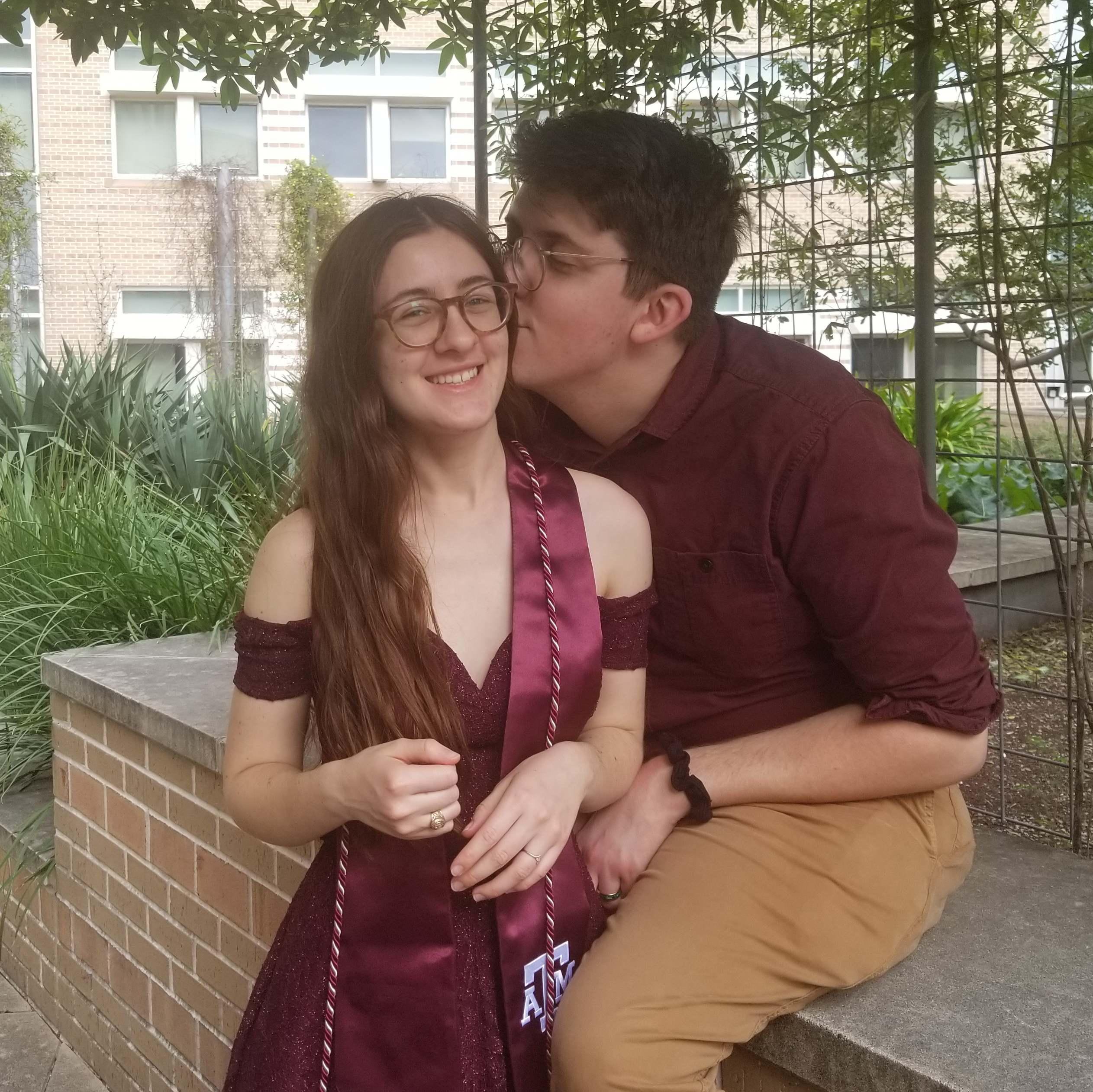 Taking pictures after Chrissi's graduation on top of the Mitchell Physics building at Texas A&M University