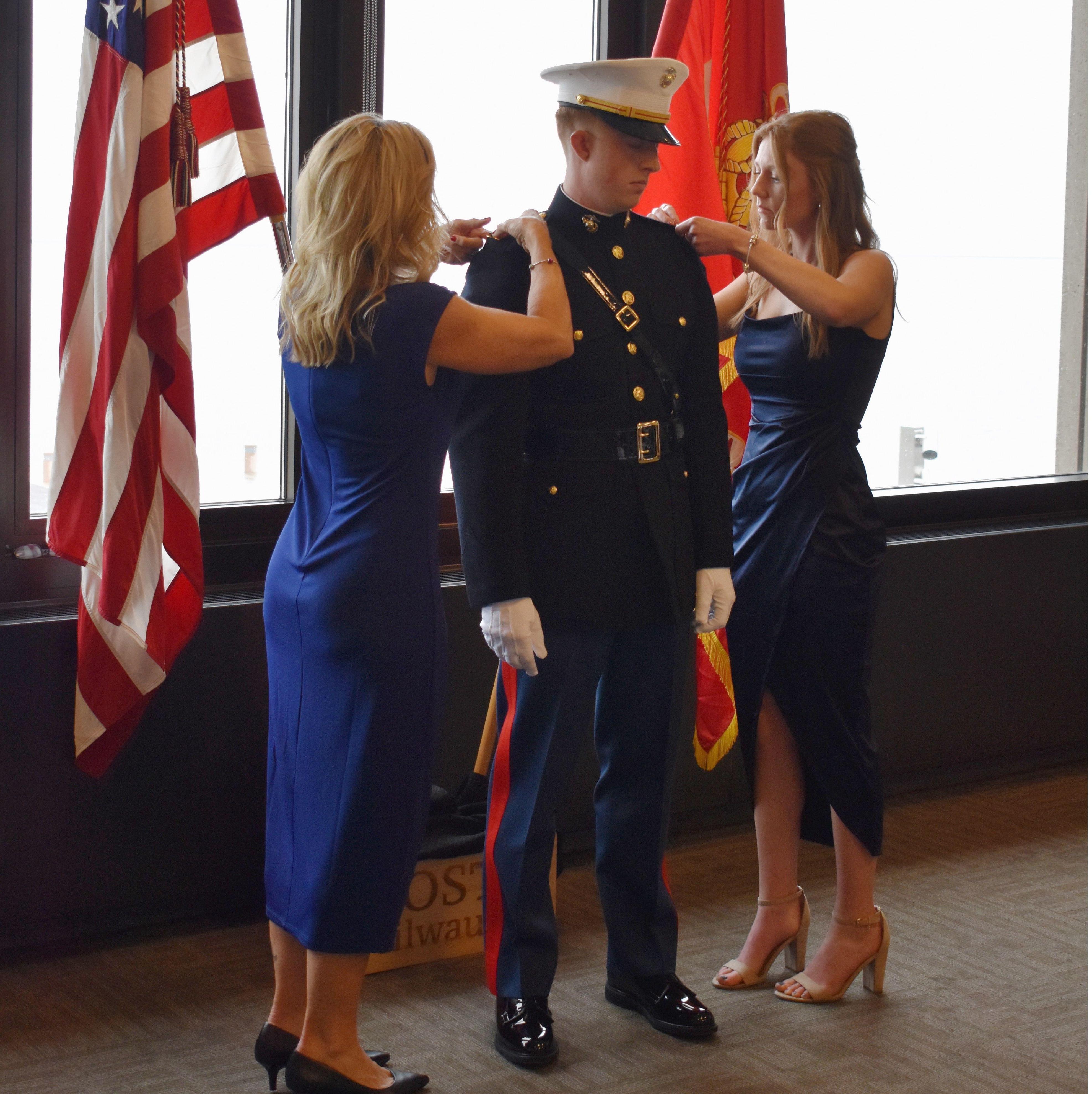Garrett commissions into the Marine Corps