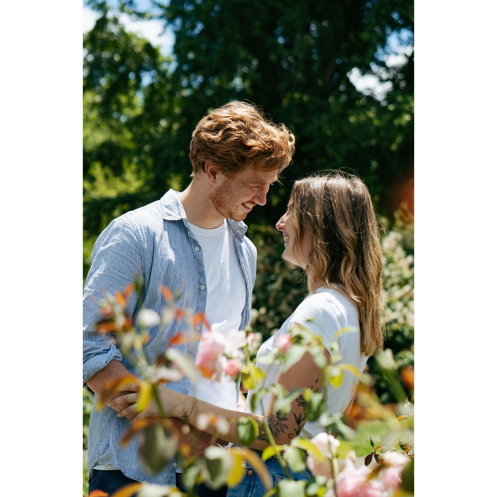 We took our engagement photos in the Park of Roses in Columbus, OH. These photos were taken by Maddie Stover.
