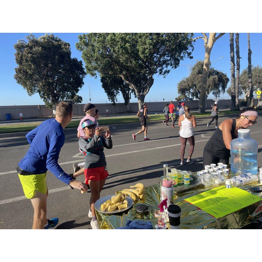 Supporting our Long Beach marathoners with a booth full of refreshments, snack, & entertainment. We remember what that run's like... oof!