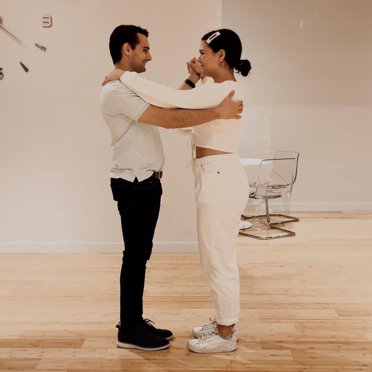 In this photo, Francis and Amanda practiced their first dance together during their first Rumba lesson in Austin!